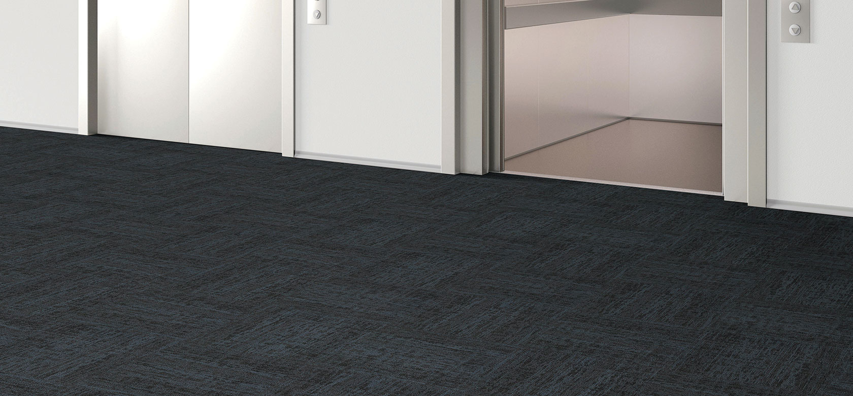 Commercial broadloom carpet in an elevator lobby