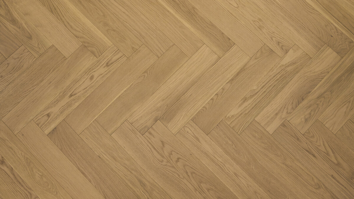 Herringbone hardwood floor installed by YYC Flooring Solutions in Calgary